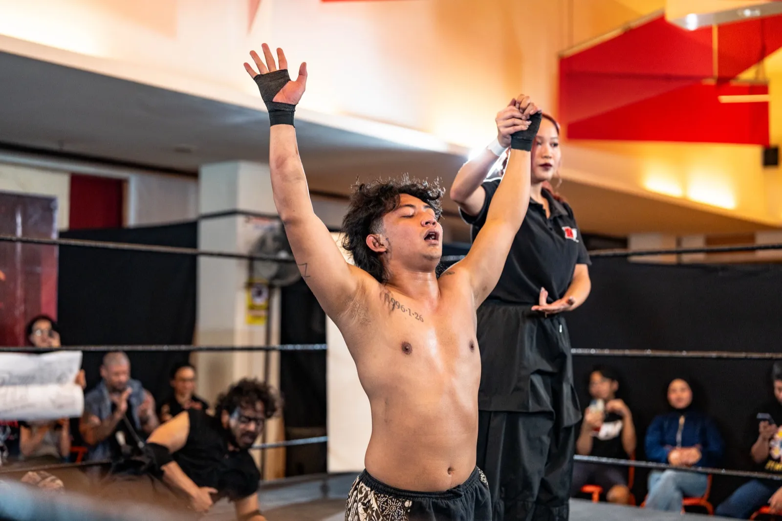 Taumata at an IDPW show