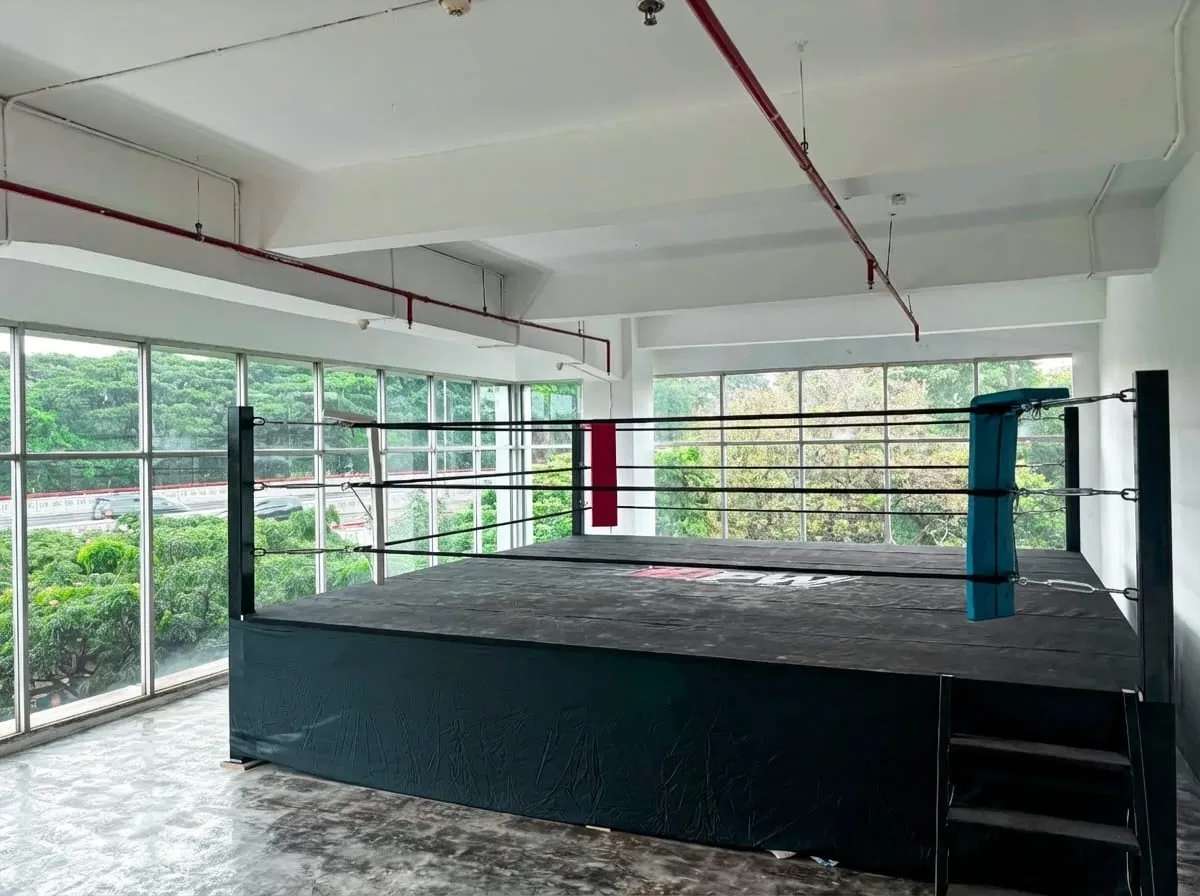 The IDPW training ring beside floor-to-ceiling windows at the Bandung headquarters